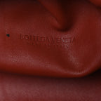 Smooth Butter Calf The Pouch Oversized Clutch Rust